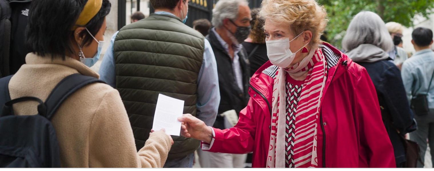 janet handing leaflet on 20 June 2021 outside BM the 12th aniversary of the Acropolis Museum